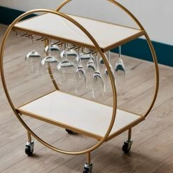 KANDR Bar Cart - Wijn Tafel - Serveer Trolley - Serveerwagen - Keukentrolley - Op Wielen - Rond - Goud -BISSELL-Winkel 550x440 1