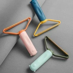 Supertarget Ultimate - Pluizenverwijderaar - Kledingontpluizer - Ontpluizer - Draagbare Lint Remover - Verwijdert Pluisjes - Voor Tapijt - Wollen Kleding - Makkelijk Mee Te Nemen -BISSELL-Winkel 550x708 1