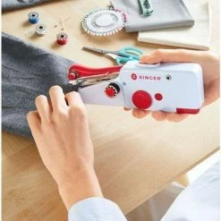 Singer - Handheld Mending Machine /Sewing Machines -BISSELL-Winkel 550x735